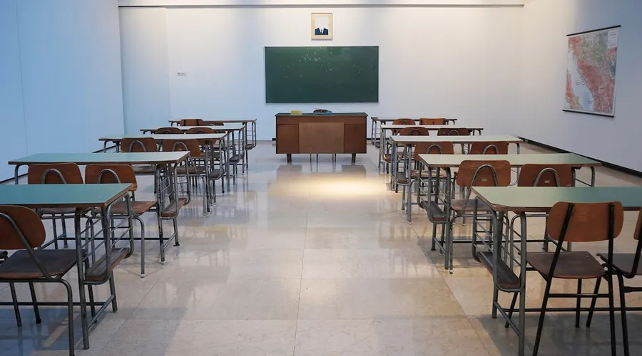 Students walking through a school hallway