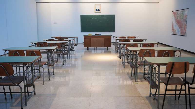 Students walking through a school hallway