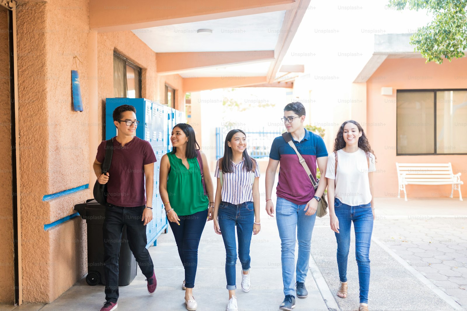 Students walking through a school corridor