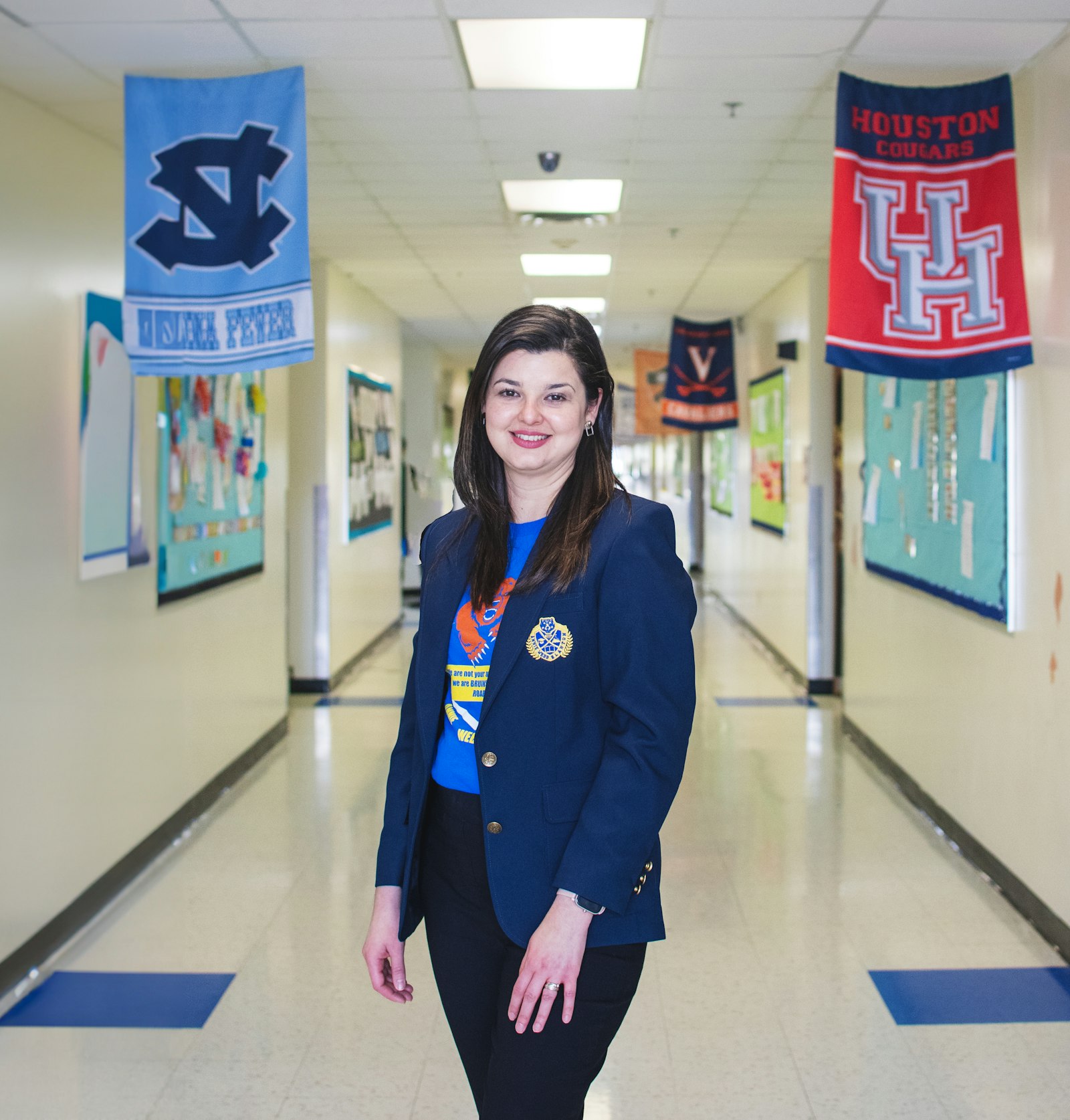 Professional standing in a school hallway